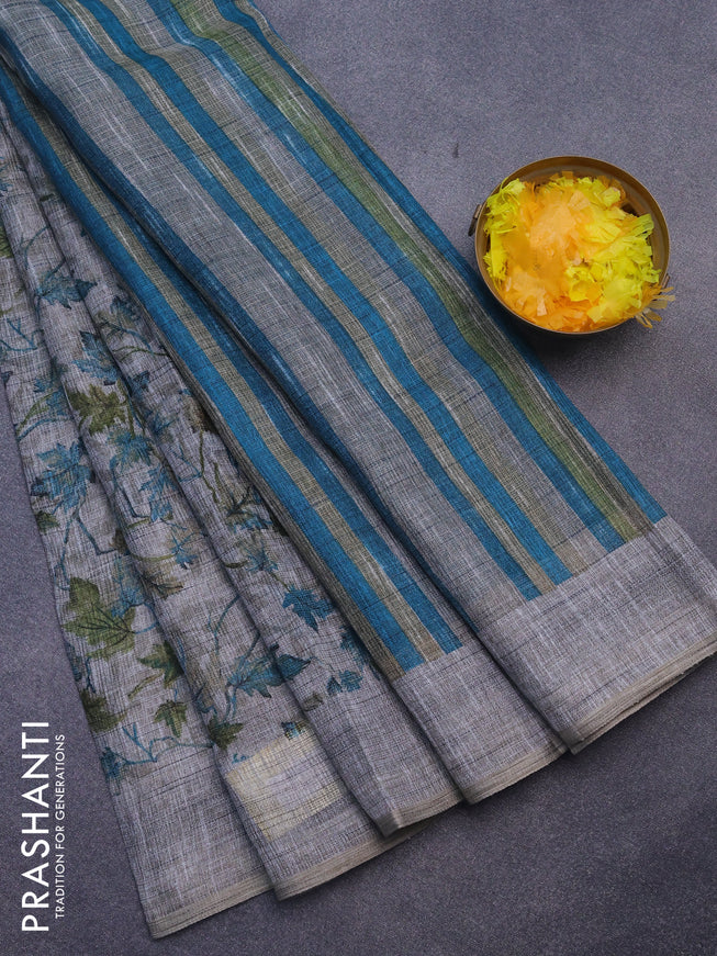 Jute cotton saree grey and blue with allover leaf prints and simple border