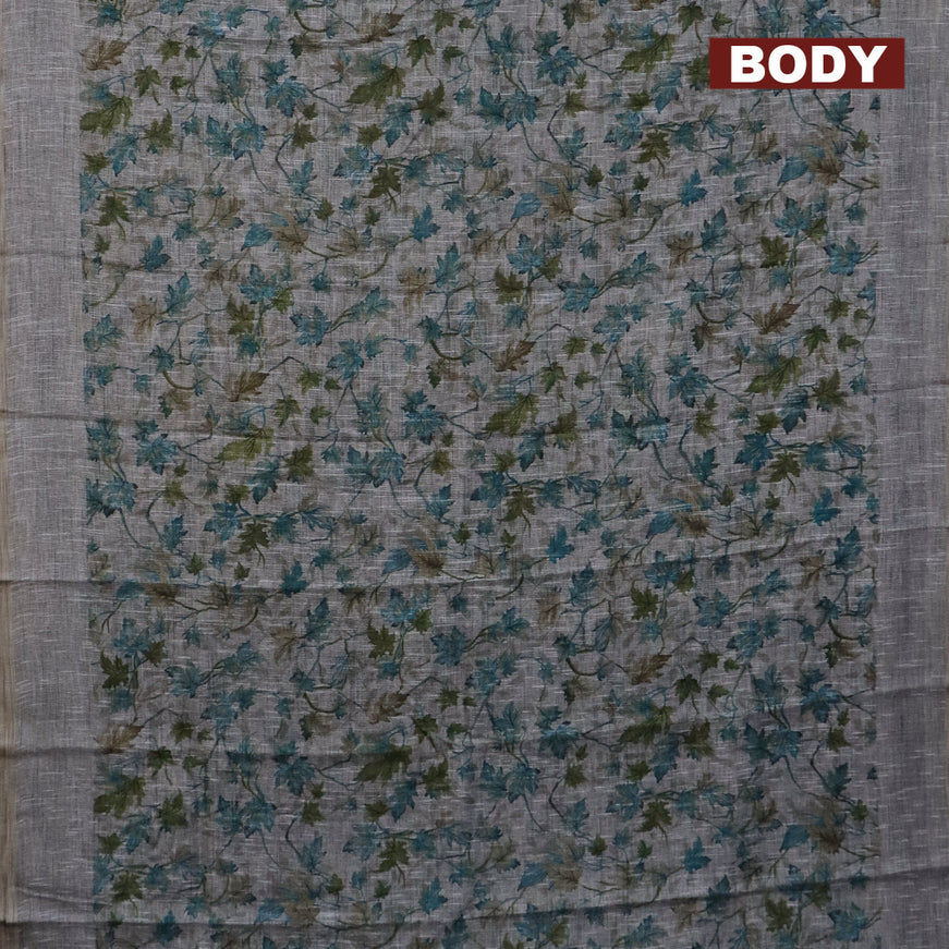 Jute cotton saree grey and blue with allover leaf prints and simple border