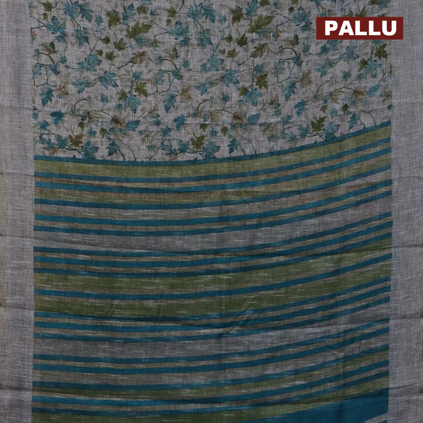 Jute cotton saree grey and blue with allover leaf prints and simple border