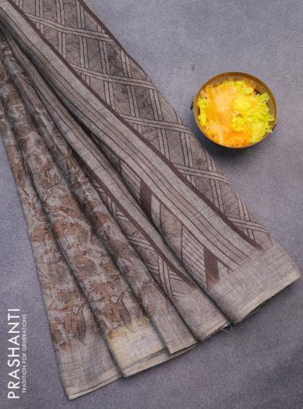 Jute cotton saree grey shade with allover floral prints and simple border