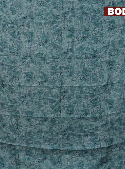 Jute cotton saree teal green shade with allover floral prints and simple border