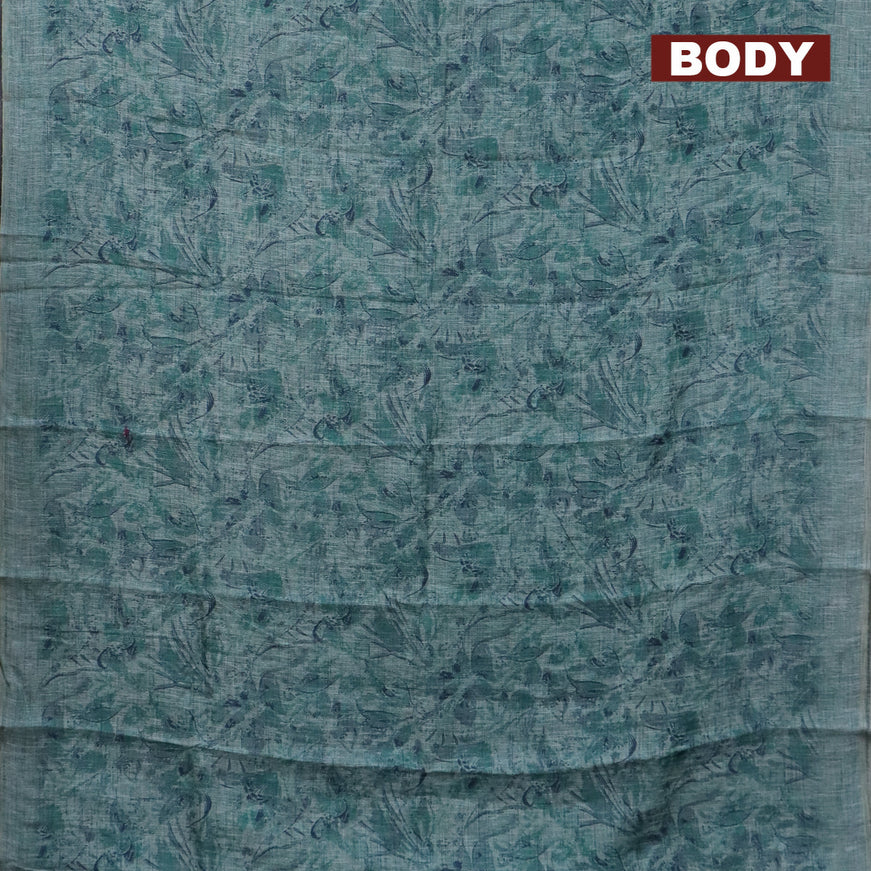 Jute cotton saree teal green shade with allover floral prints and simple border