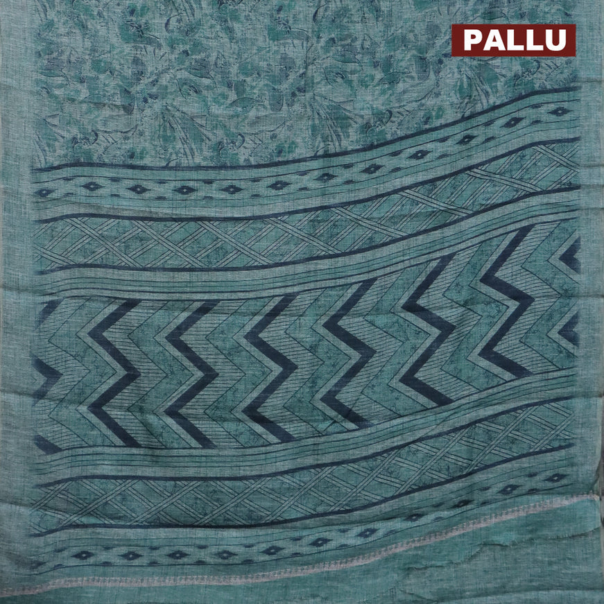 Jute cotton saree teal green shade with allover floral prints and simple border