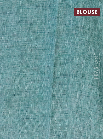 Jute cotton saree teal green shade with allover floral prints and simple border