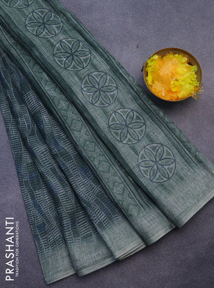 Jute cotton saree sap green with allover prints and simple border