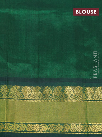 Kuppadam silk cotton saree dual shade of peach orange and dark green with paisley zari woven buttas and rich zari woven border