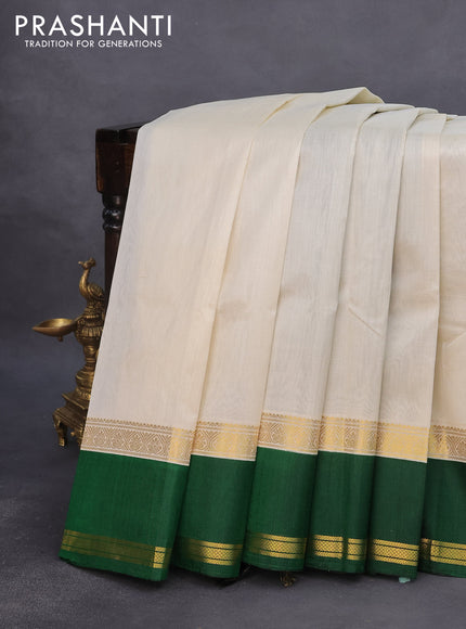 Kuppadam silk cotton saree off white and dark green with plain body and rettapet zari woven border