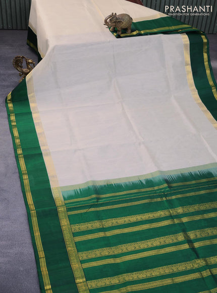 Kuppadam silk cotton saree off white and dark green with plain body and rettapet zari woven border