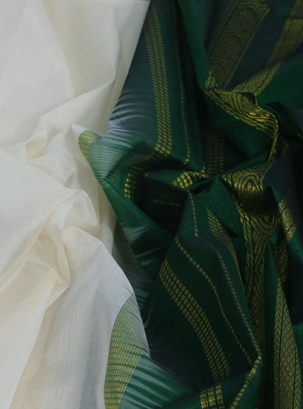 Kuppadam silk cotton saree off white and dark green with plain body and rettapet zari woven border