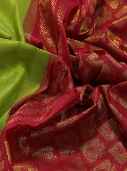 Kuppadam silk cotton saree light green and red with paisley zari woven buttas and rich zari woven border