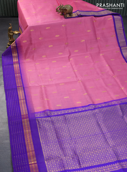 Kuppadam silk cotton saree mauve pink and violet with zari woven buttas and temple design zari woven border