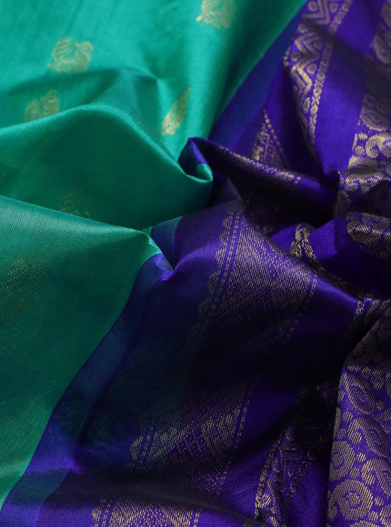 Kuppadam silk cotton saree teal green and blue with annam zari woven buttas and zari woven border