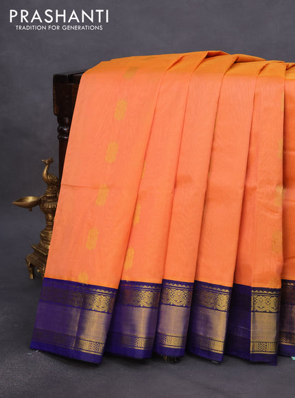 Kuppadam silk cotton saree peach orange and blue with zari woven buttas and zari woven border