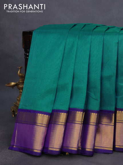 Kuppadam silk cotton saree teal blue and blue with plain body and zari woven korvai border