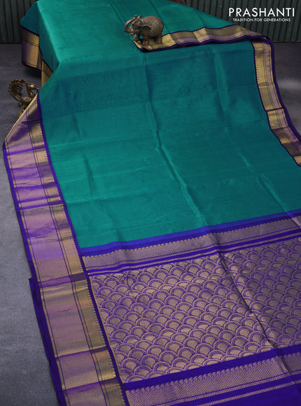 Kuppadam silk cotton saree teal blue and blue with plain body and zari woven korvai border