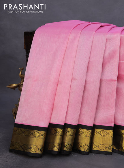 Kuppadam silk cotton saree light pink and black with plain body and zari woven korvai border