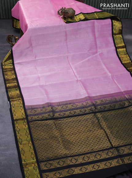 Kuppadam silk cotton saree light pink and black with plain body and zari woven korvai border