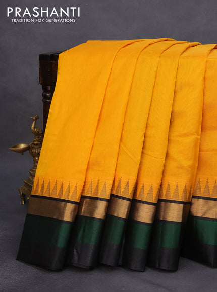 Kuppadam silk cotton saree mango yellow and green with plain body and temple design zari woven border