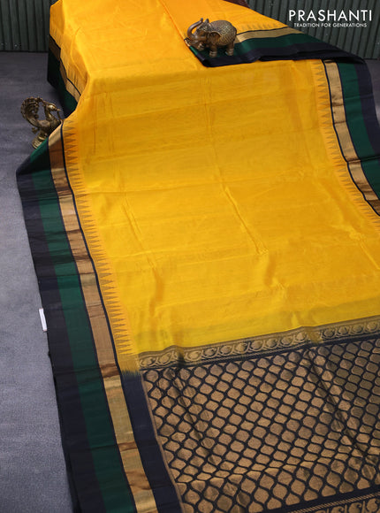 Kuppadam silk cotton saree mango yellow and green with plain body and temple design zari woven border