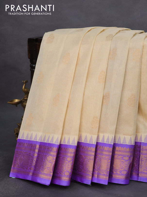 Kuppadam silk cotton saree cream and lavender with allover vairosi pattern & buttas and temple design zari woven border