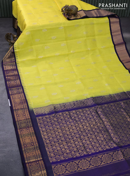 Kuppadam silk cotton saree lime yellow and dark blue with allover vairosi pattern & buttas and temple design zari woven border