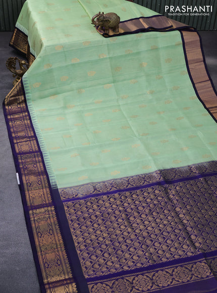 Kuppadam silk cotton saree pista green and deep violet with allover vairosi pattern & buttas and temple design zari woven border