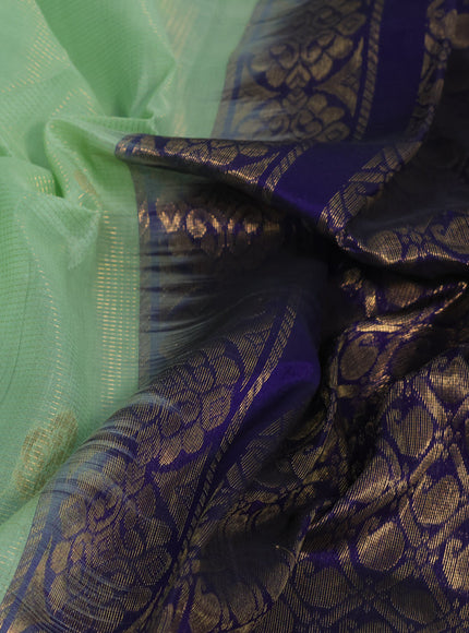 Kuppadam silk cotton saree pista green and deep violet with allover vairosi pattern & buttas and temple design zari woven border