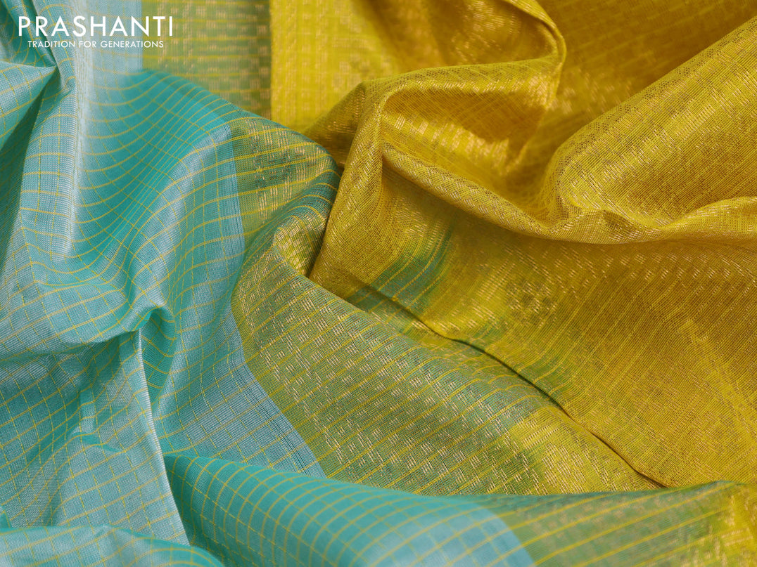 Kuppadam silk cotton saree teal green shade and yellow with allover checked pattern and temple design paisley zari woven butta border