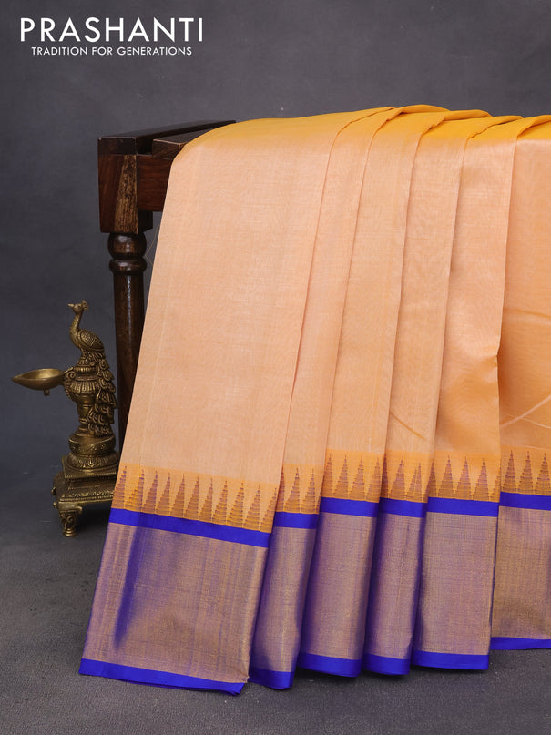 Kuppadam silk cotton saree pale orange and blue with plain body and temple design zari woven border