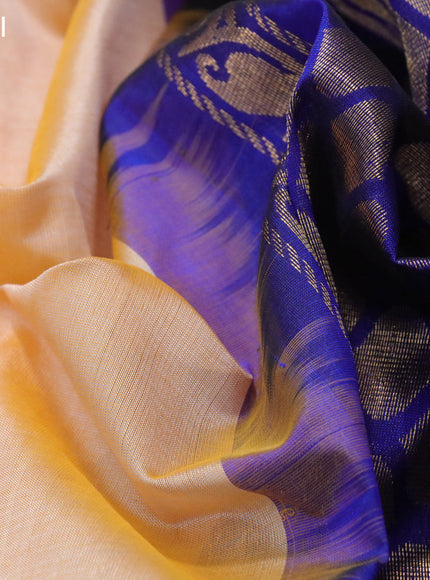 Kuppadam silk cotton saree pale orange and blue with plain body and temple design zari woven border