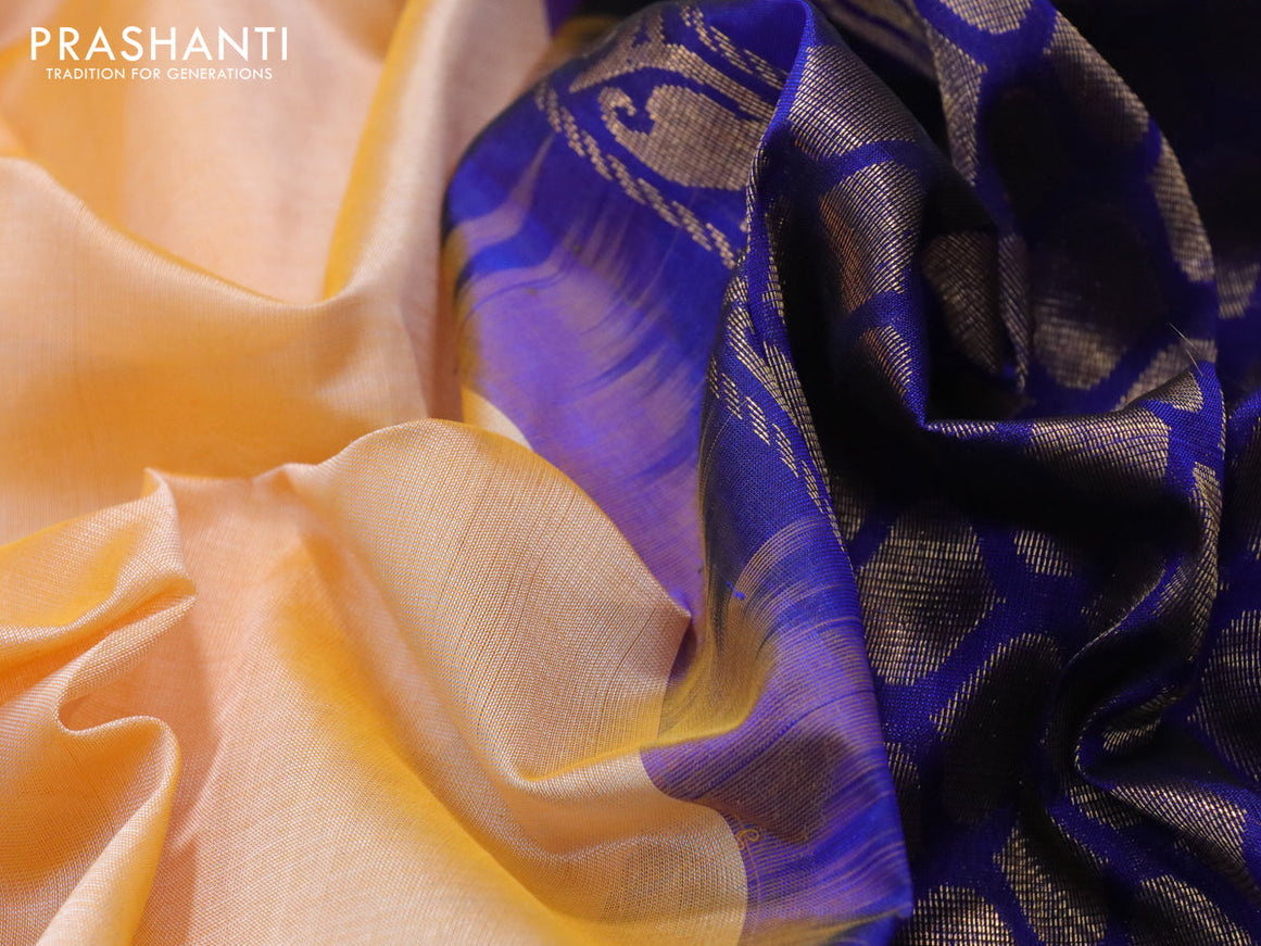 Kuppadam silk cotton saree pale orange and blue with plain body and temple design zari woven border