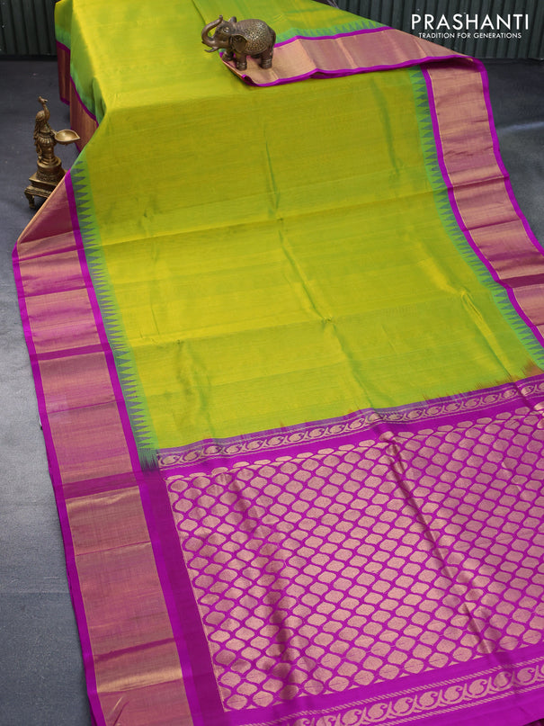 Kuppadam silk cotton saree dual shade of light green and purple with plain body and temple design zari woven border