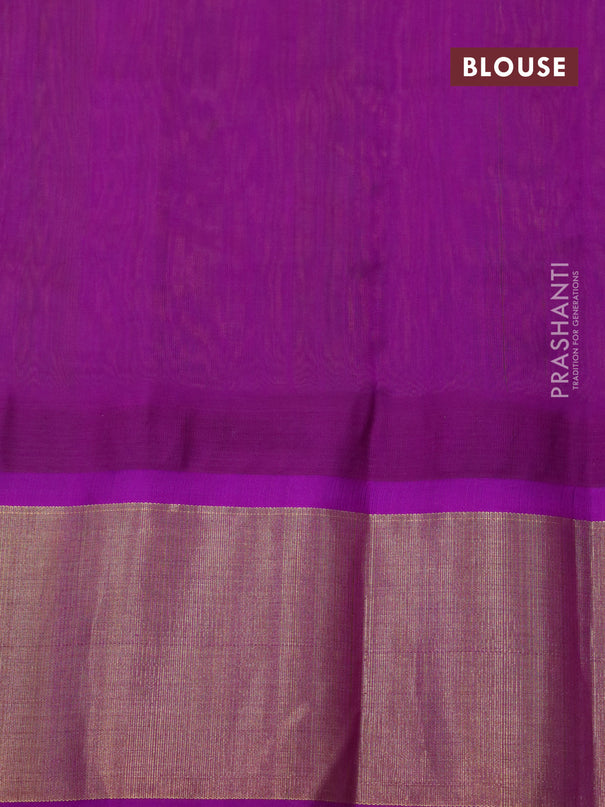 Kuppadam silk cotton saree dual shade of light green and purple with plain body and temple design zari woven border