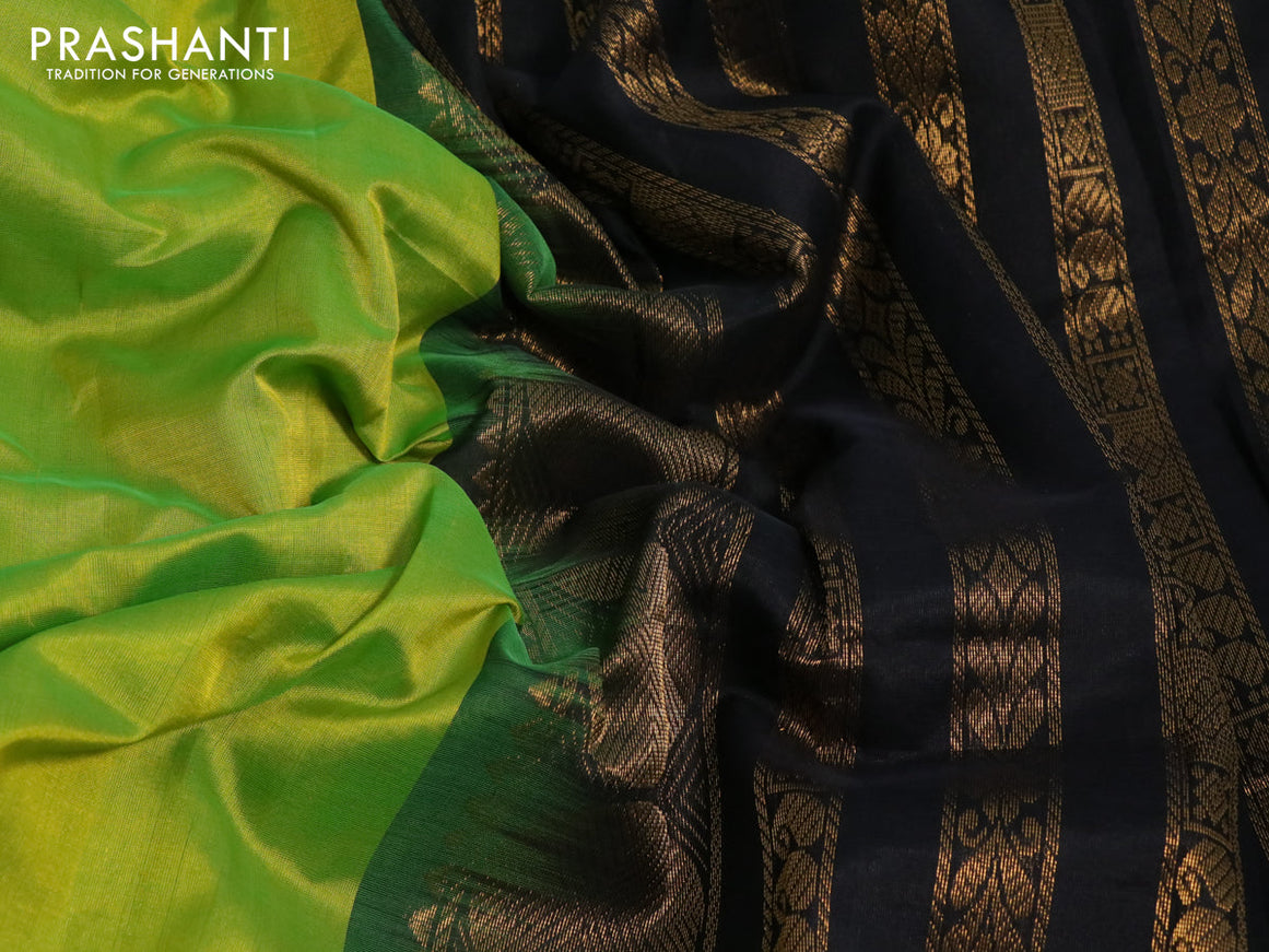 Silk cotton saree light green and black with plain body and rudhraksha zari woven korvai border