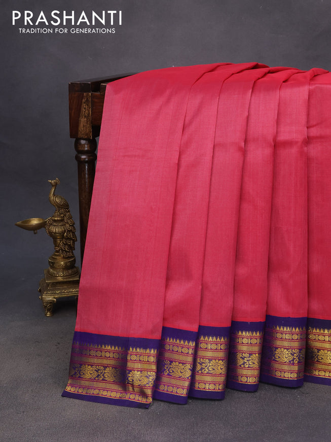 Silk cotton saree pink shade and blue with plain body and zari woven korvai border