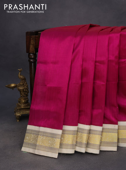 Silk cotton saree magenta pink and cream with plain body and zari woven korvai border