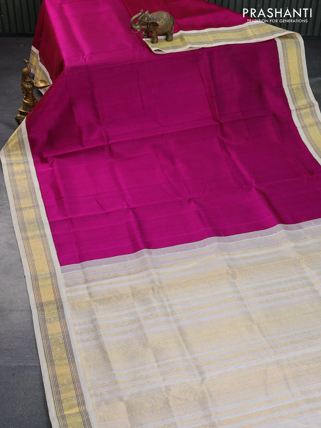 Silk cotton saree magenta pink and cream with plain body and zari woven korvai border