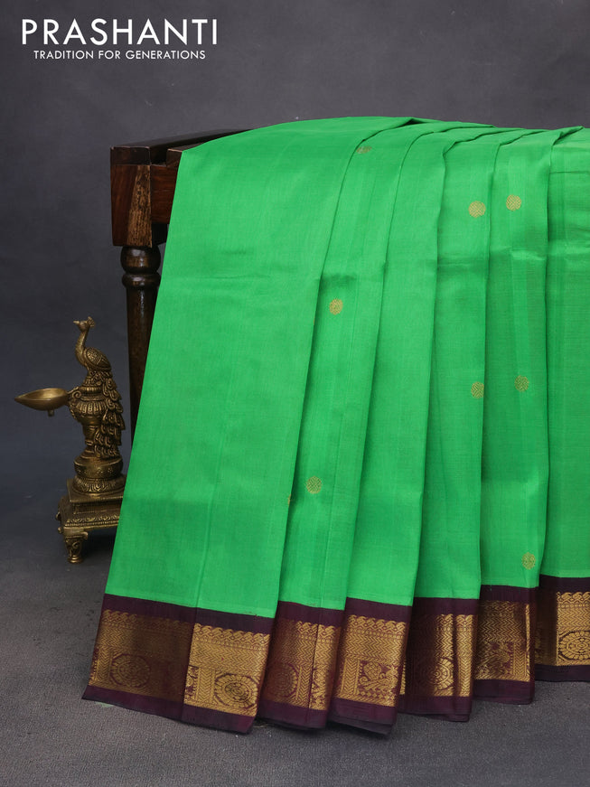 Silk cotton saree green and wine shade with zari woven buttas and zari woven korvai border