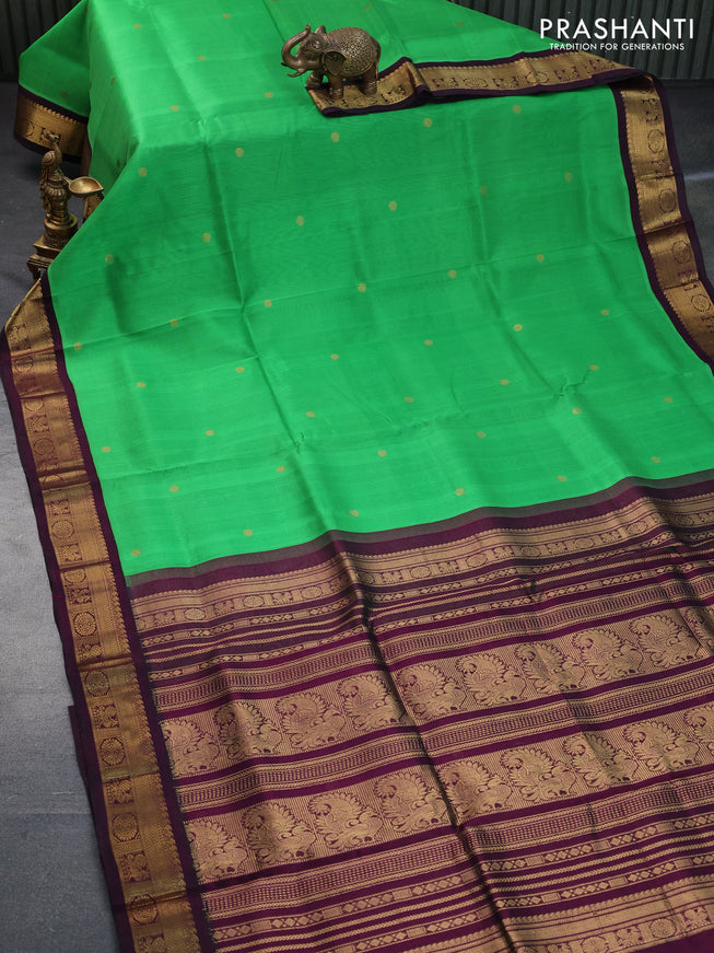 Silk cotton saree green and wine shade with zari woven buttas and zari woven korvai border