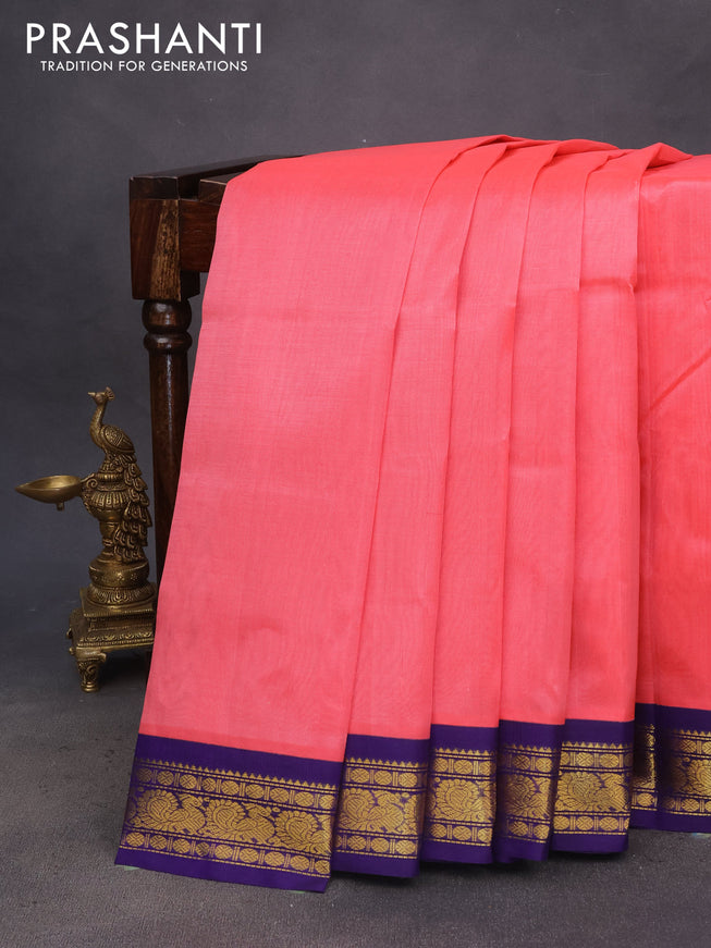 Silk cotton saree peach pink and blue with plain body and zari woven korvai border