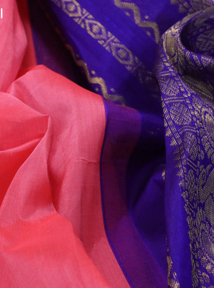 Silk cotton saree peach pink and blue with plain body and zari woven korvai border