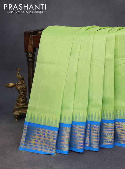 Silk cotton saree pista green and cs blue with plain body and temple design zari woven border