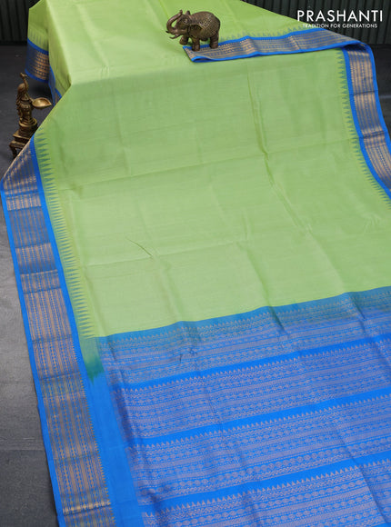 Silk cotton saree pista green and cs blue with plain body and temple design zari woven border