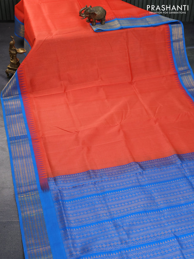 Silk cotton saree orange and cs blue with plain body and temple design zari woven border