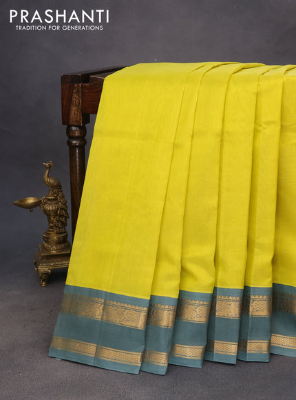 Silk cotton saree lime yellow and grey shade with plain body and rettapet zari woven korvai border