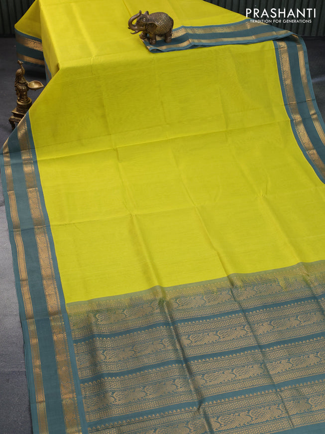 Silk cotton saree lime yellow and grey shade with plain body and rettapet zari woven korvai border