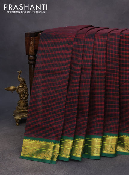 Silk cotton saree black and green with allover checked pattern and zari woven korvai border