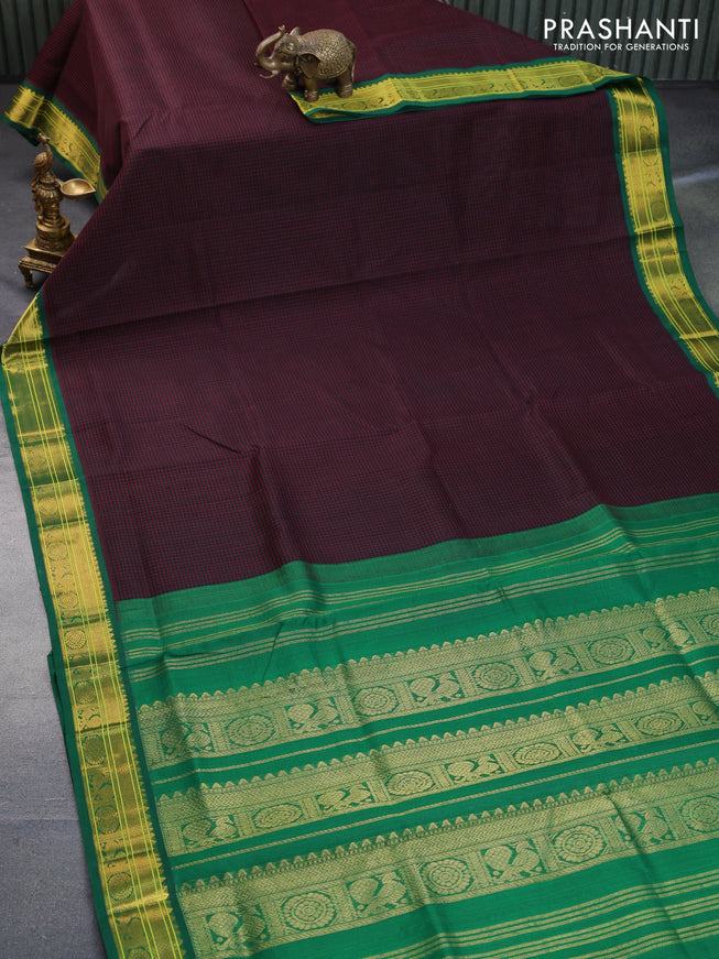 Silk cotton saree black and green with allover checked pattern and zari woven korvai border