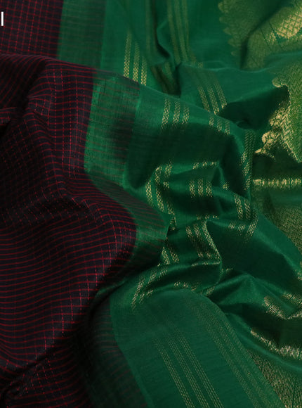 Silk cotton saree black and green with allover checked pattern and zari woven korvai border