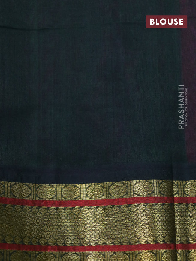 Silk cotton saree pink shade and bottle green with plain body and zari woven korvai border